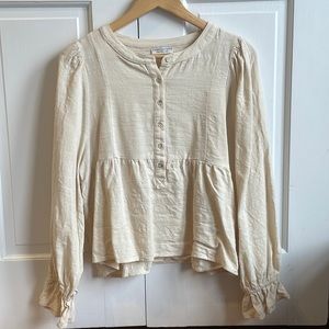 The Bergen Long Sleeve Peplum Blouse in Ivory